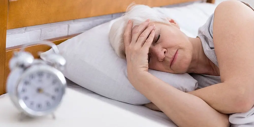 vrouw slecht slapen door overgang hormonen 