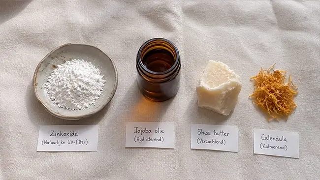 ingrediënten voor natuurlijke zonnebrand met zinkoxide en plantaardige oliën